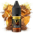 Líquido para vapeo Magnum Vape Salt Sweet Tobacco 10ml, botella con diseño colorido acompañada de hojas de tabaco que representan su sabor dulce y suave.